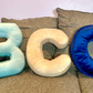 Bluestem & Co. Letter Throw Pillows - Aqua