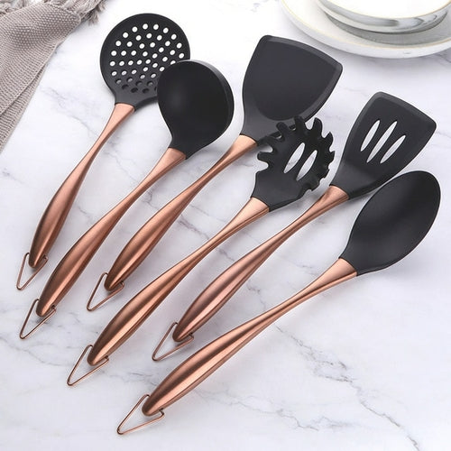 https://bluestemandco.com/cdn/shop/products/Gold-Cooking-Tool-Set-Silicone-Head-Kitchenware-Stainless-Steel-Handle-Soup-Ladle-Colander-Set-Turner-Serving.jpg_640x640_b0fc130b-68de-4837-9a7e-3a1b0fd55854.jpg?v=1672614797&width=500